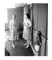Clarkie Walton (mother of Ann & Cathy), Eloise, Cathy outside our screened carport